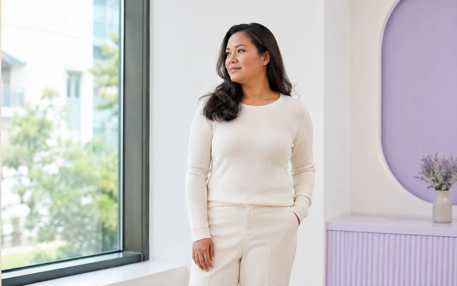 Adult woman in relaxed neutral clothing for a body-contouring consultation editorial