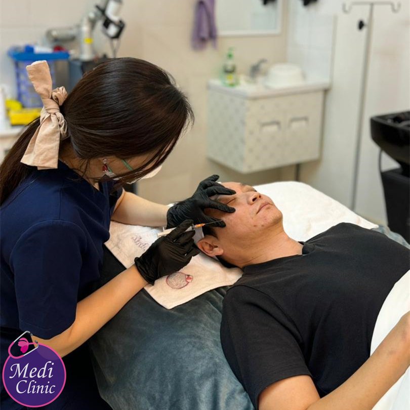 Licensed aesthetic doctor in Johor Bahru near Singapore border displaying medical certifications